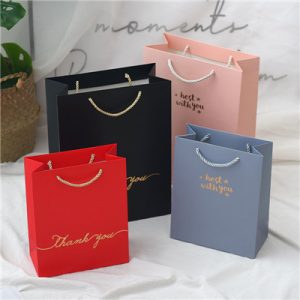 Factory price durable clothing packaging paper bag